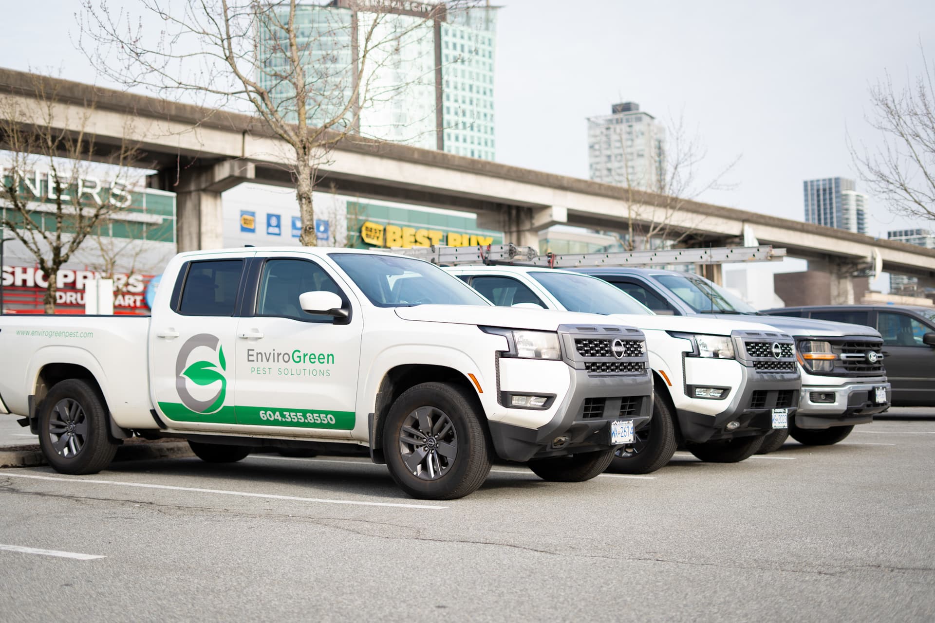 EnviroGreen pest-control service vehicles supporting Surrey properties